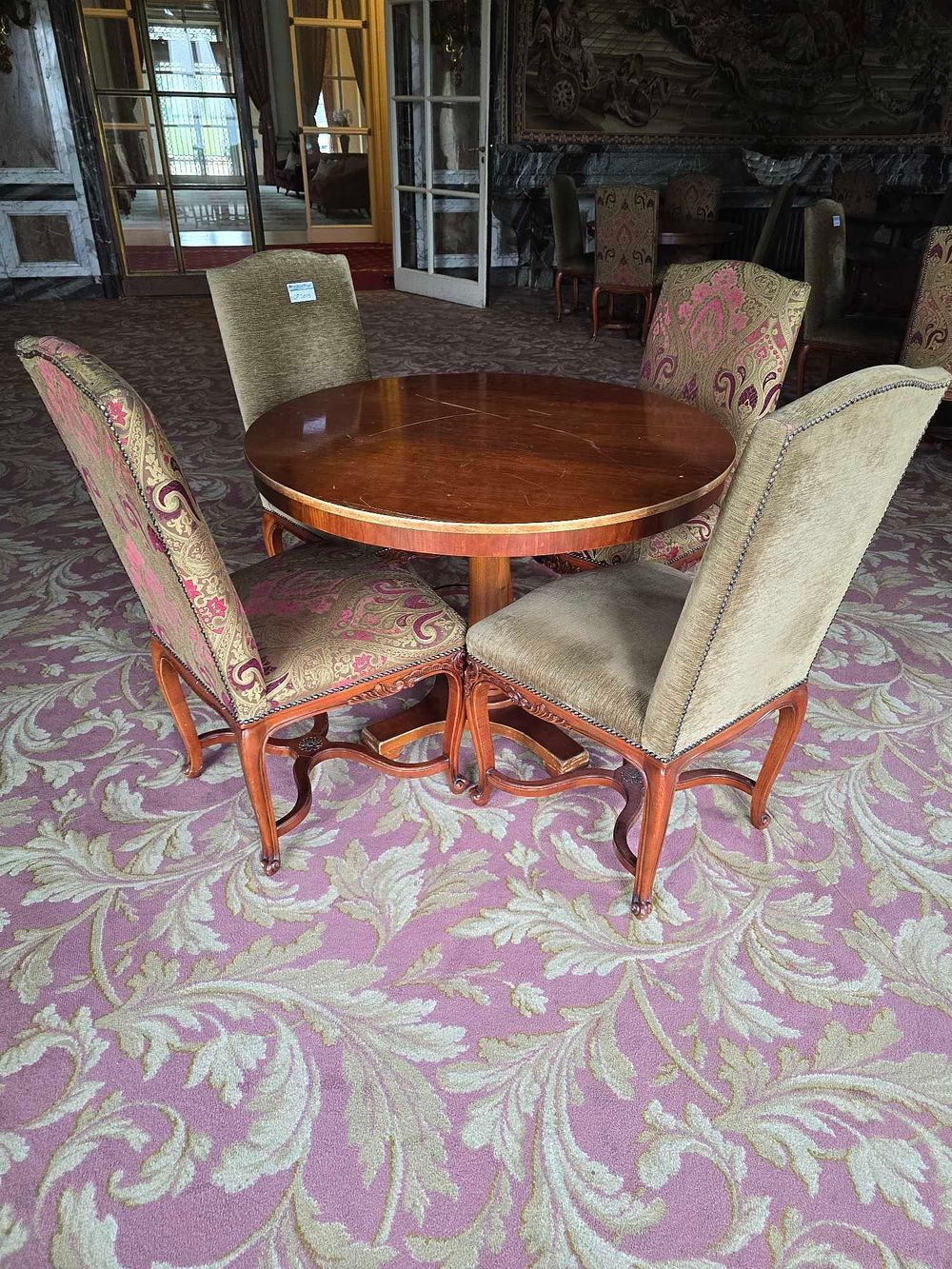Lot 2015: A Rococo Revival Style Mahogany Pedestal Dining Table and Four Upholstered Chairs