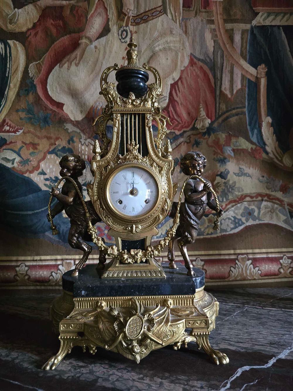 Lot 2026: Imperial Brevettato Italian Gilt Metal and Marble Mantel Clock with Figural Satyr Mounts