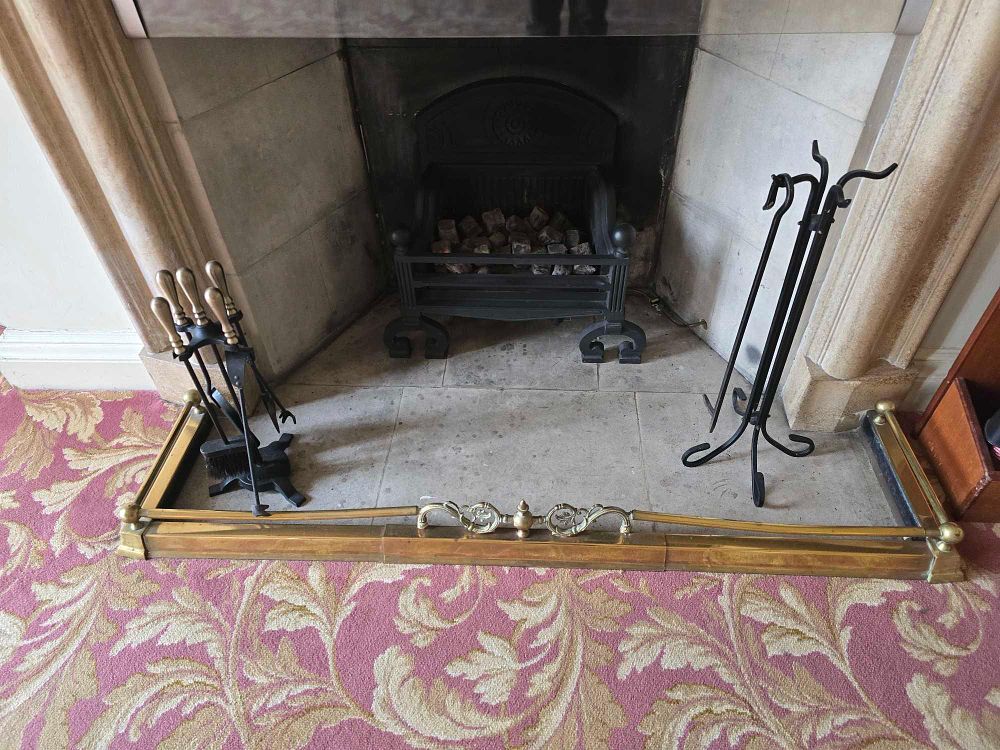 Lot 2036: A Late 19th / Early 20th Century Brass Fireplace Fender and Two Sets of Fire Tools