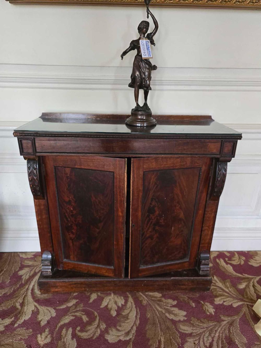 Lot 2044: An English Regency Period Mahogany Cabinet