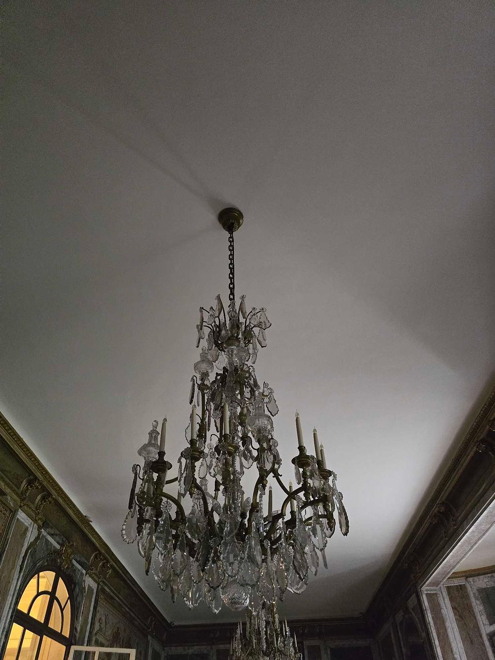 Lot 2061: A Late 19th Century Italian or French Eight-Light Patinated Metal and Crystal Chandelier