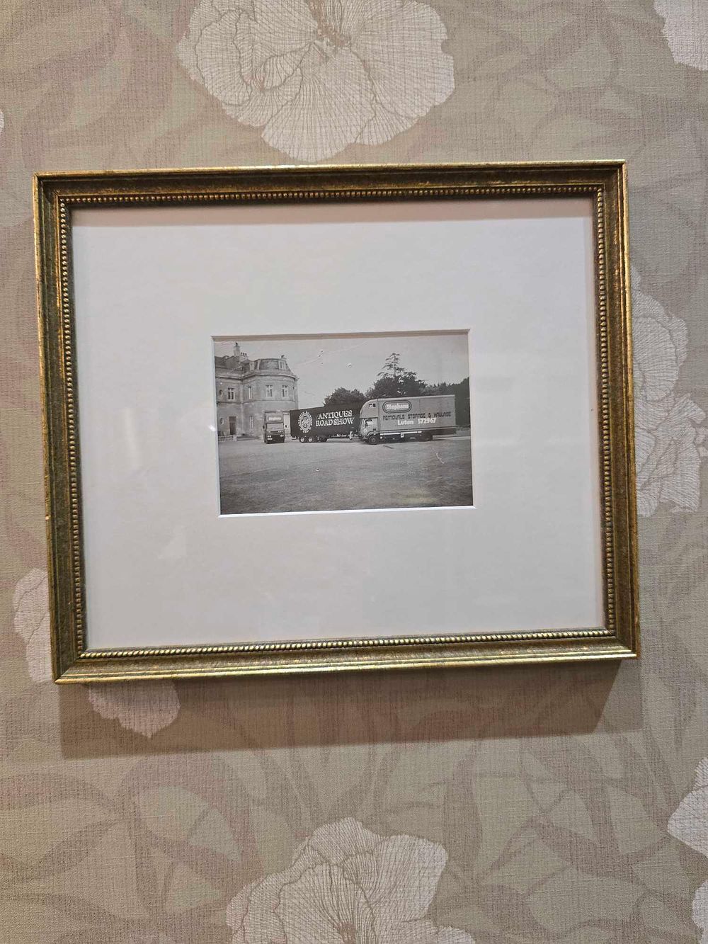 Lot 2068: Vintage Framed Black and White Photograph of Antiques Roadshow and Stephen's Removals Trucks
