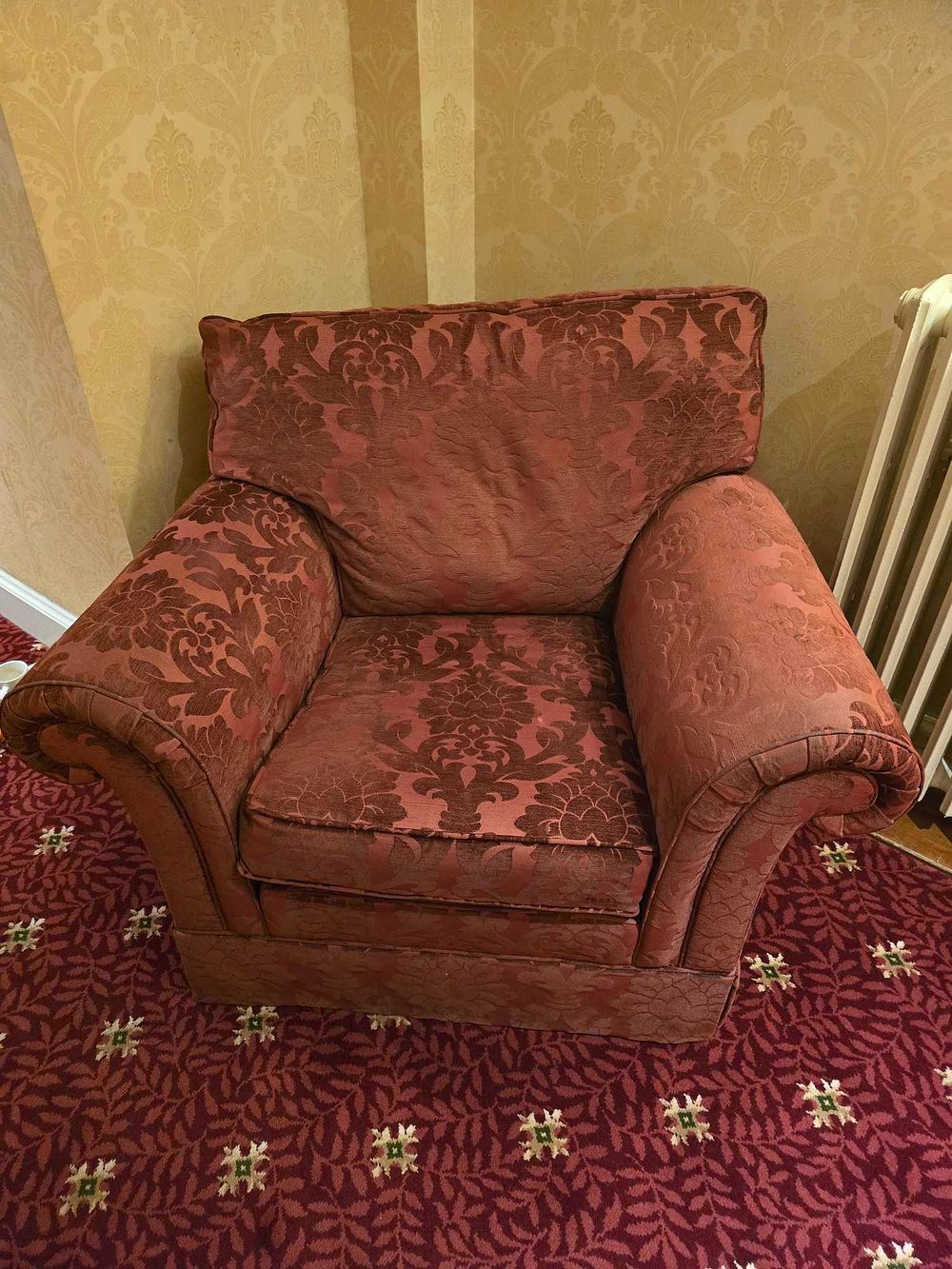 Lot 2085: A Traditional Rolled Arm Armchair Upholstered in Red and Burgundy Damask