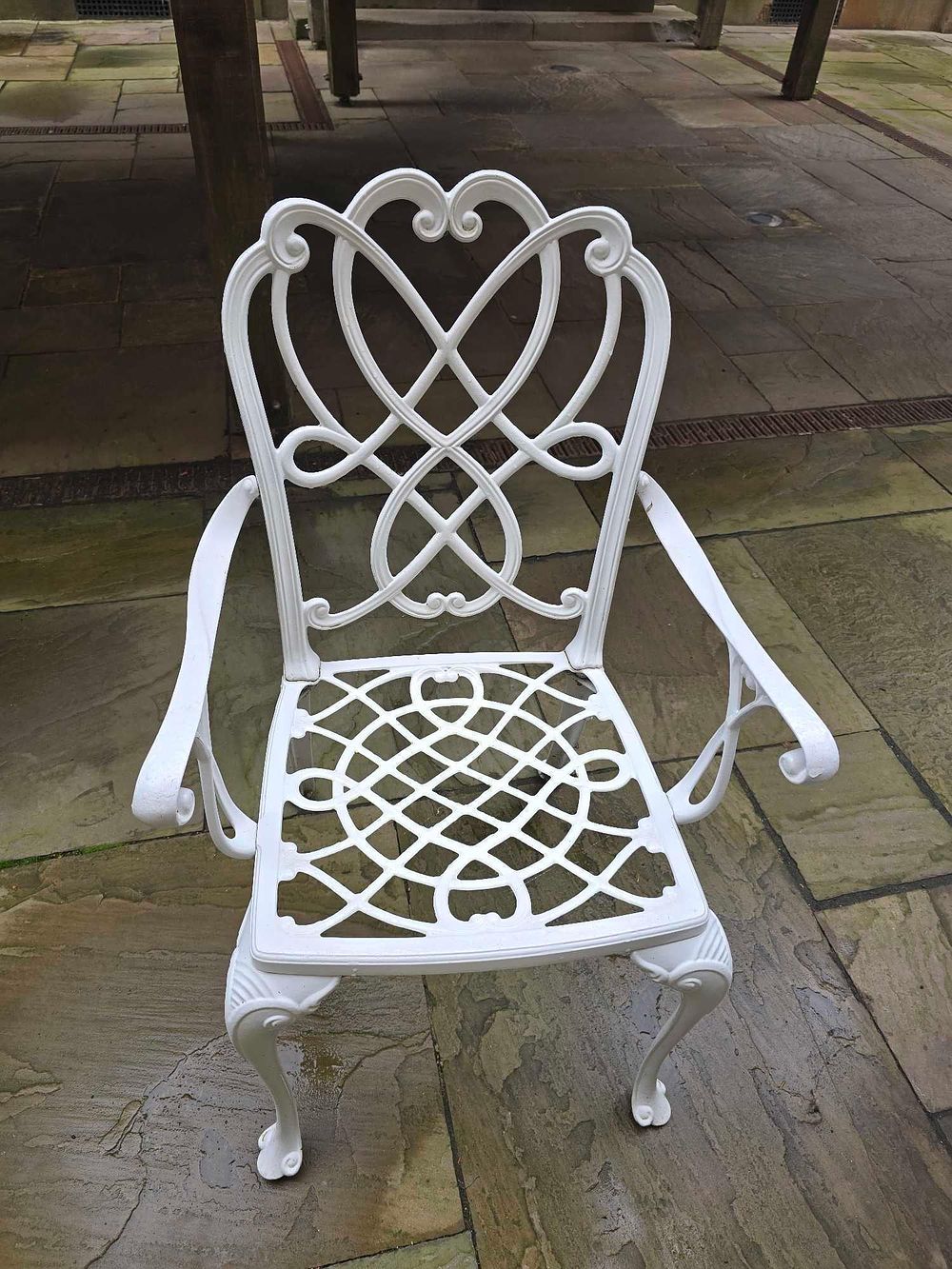 Lot 2087: A Five-Piece Rococo-Inspired Cast Aluminum Outdoor Dining Set