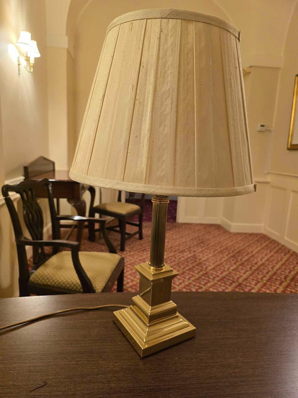 Lot 2108: A Brass-Tone Corinthian Column Table Lamp with Pleated Shade