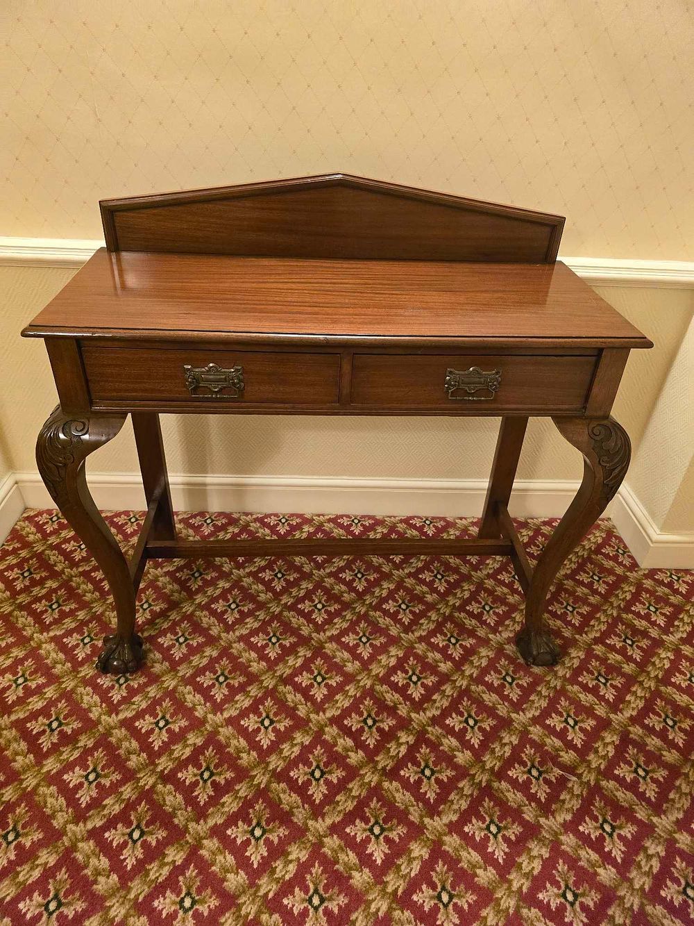 Lot 2112: A Queen Anne Style Mahogany Console Table with Claw and Ball Feet