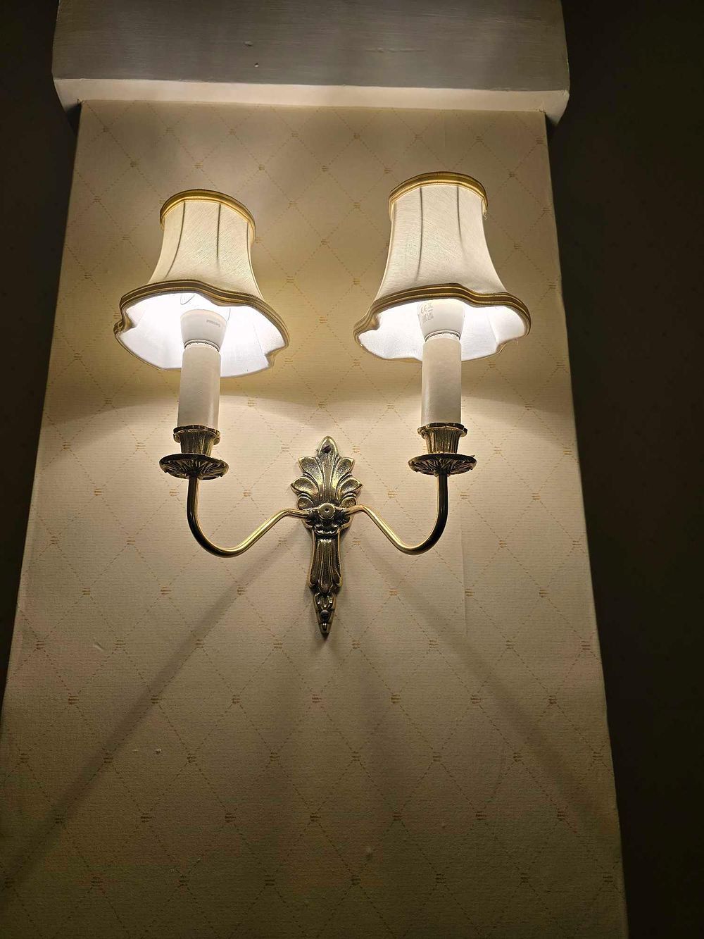 Lot 2115: A European Style Double-Arm Brass-Toned Electric Wall Sconce