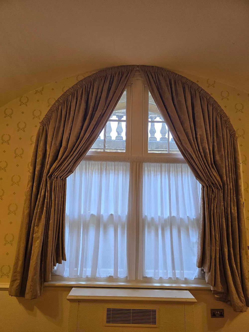 Lot 2124: A Pair of Custom-Fitted Arched Window Drapes