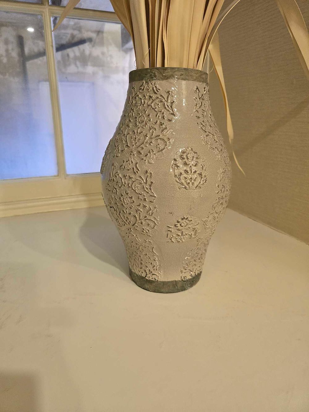 Lot 2134: A Modern Decorative Ceramic Vase with Embossed Floral Motifs