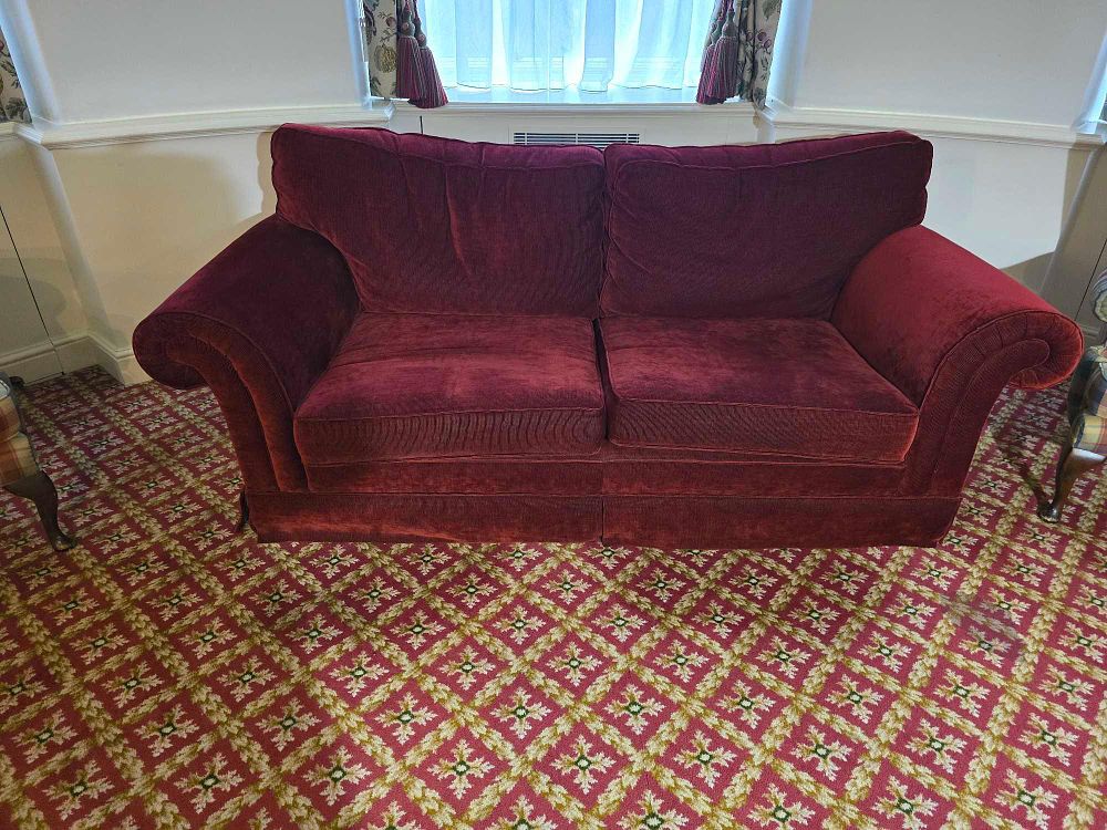 Lot 2150: A Late 20th/Early 21st Century Dark Red Ribbed Velvet Rolled Arm Loveseat