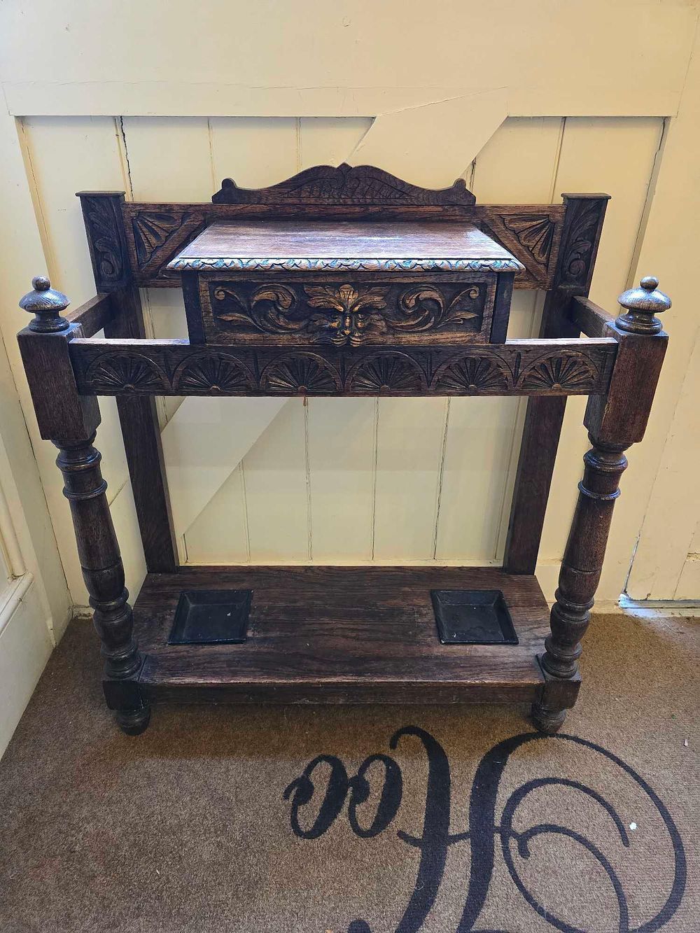 Lot 2179: A Victorian Gothic Revival 'Green Man' Carved Oak Hall Stand