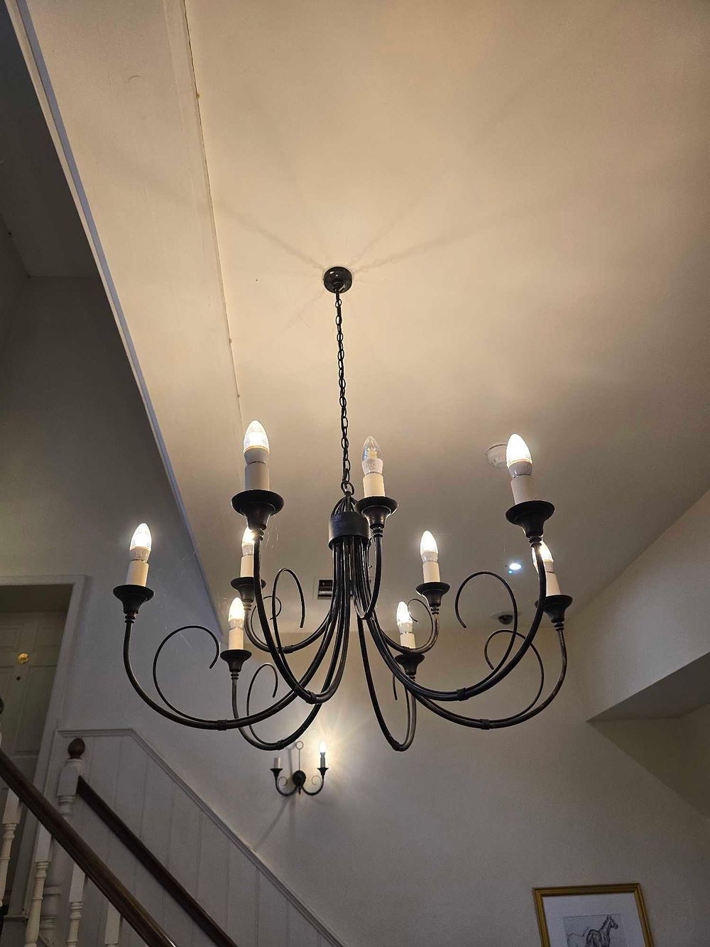Lot 2187: A Matte Black Eight-Light Farmhouse Style Chandelier