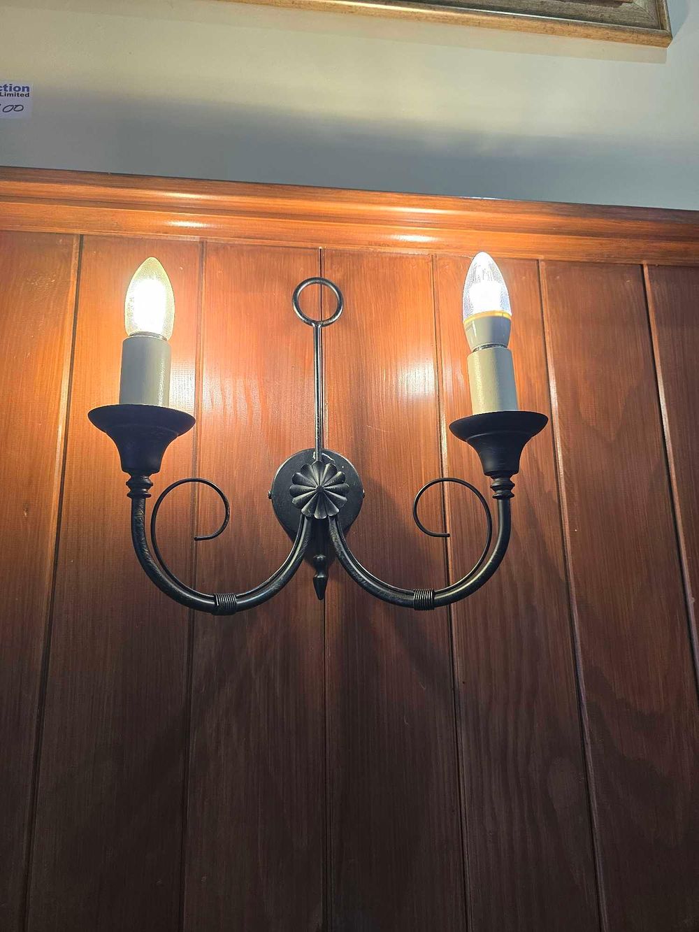 Lot 2201: A Traditional Style Black Metal Two-Light Wall Sconce