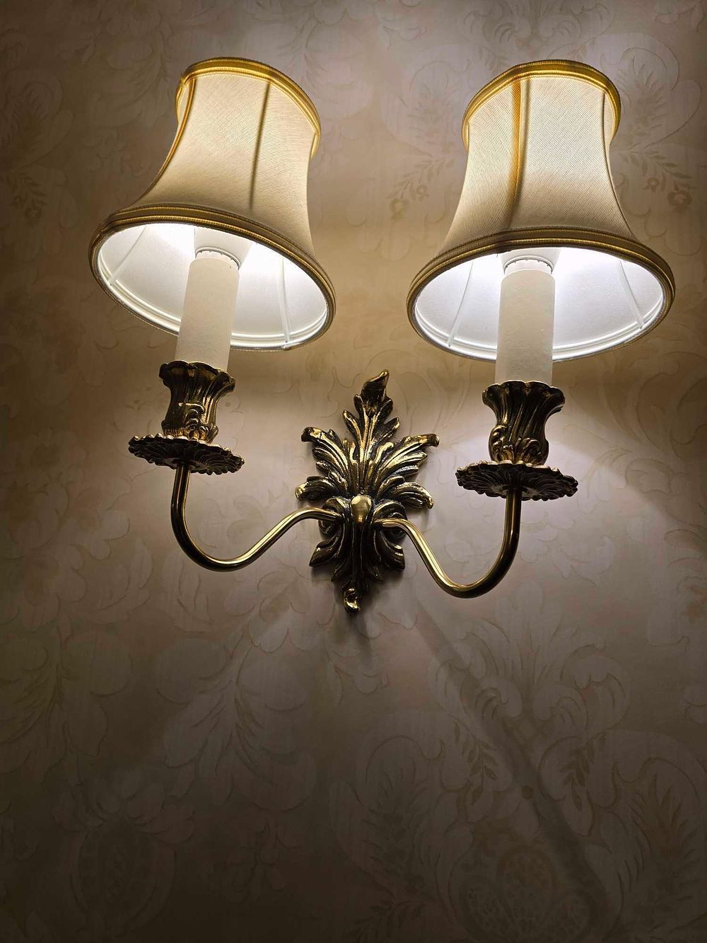 Lot 2247: A 1920s Colonial Revival Brass Double-Arm Wall Sconce