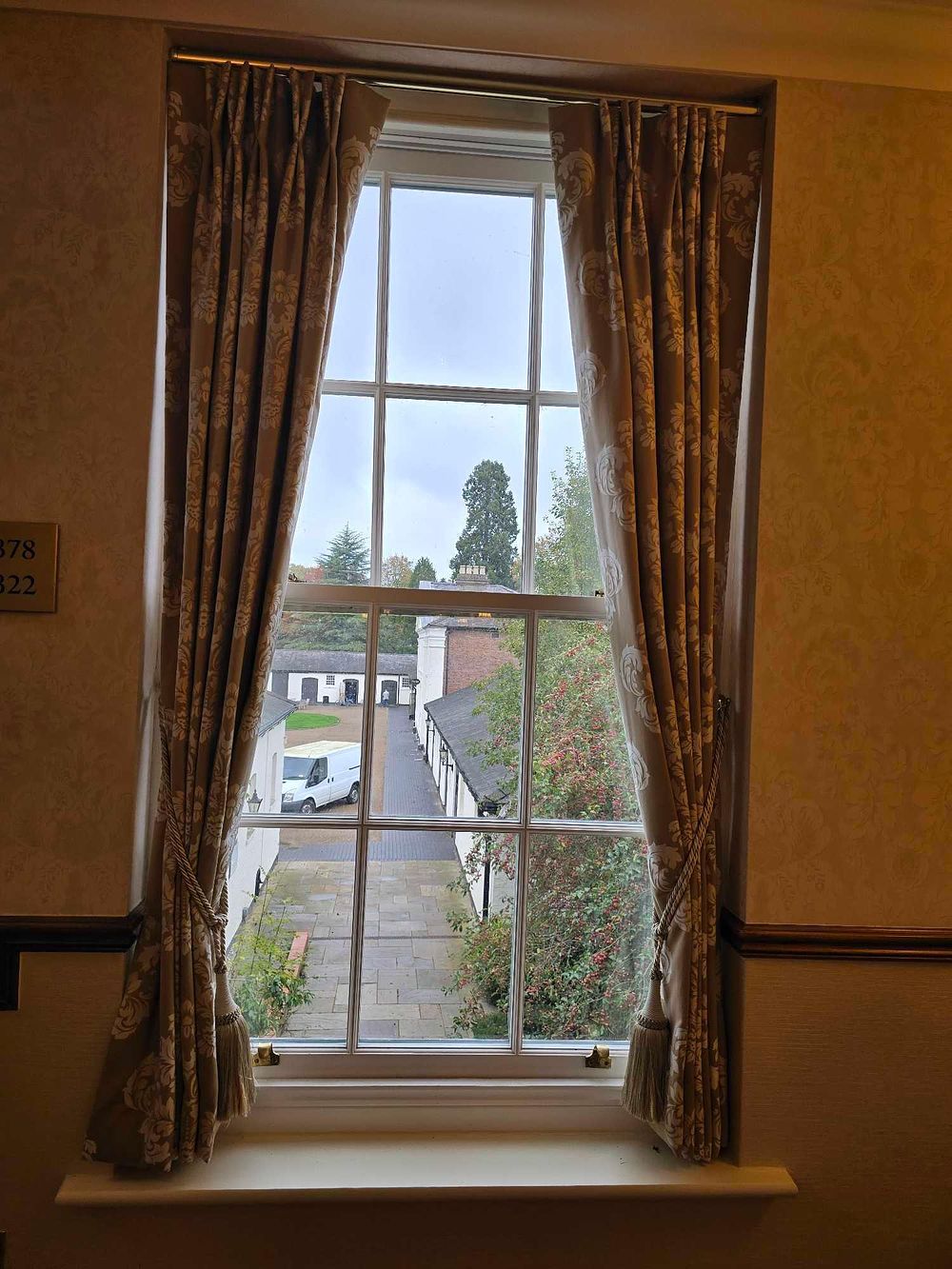 Lot 2263: A Pair of Traditional-Style Damask Pattern Curtains with Tie-Backs
