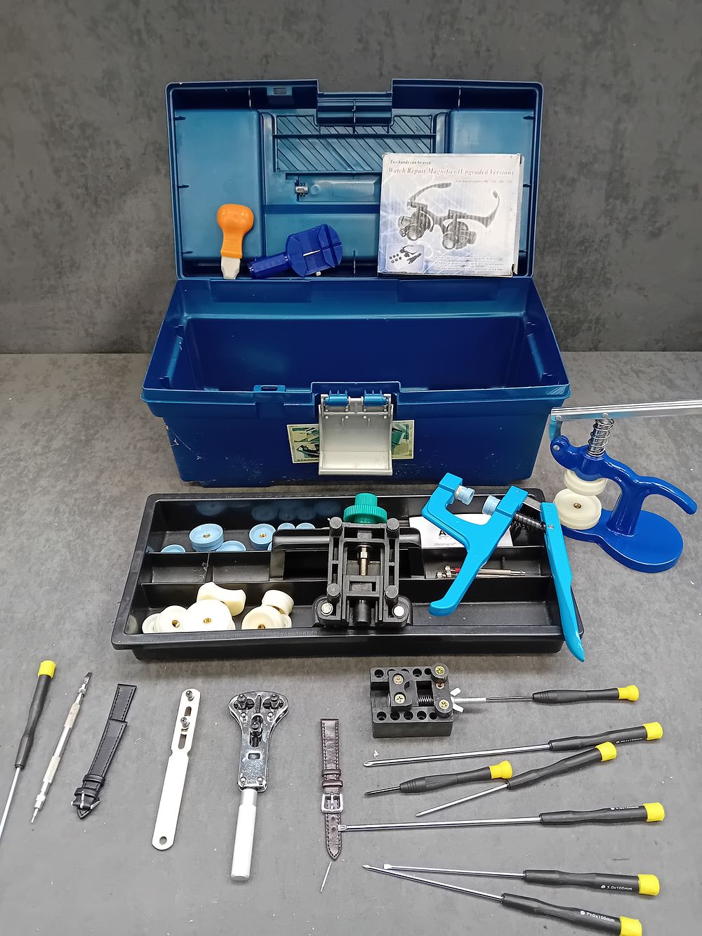 Lot 394: A Modern Watch Repair Tool Kit in Blue Plastic Toolbox