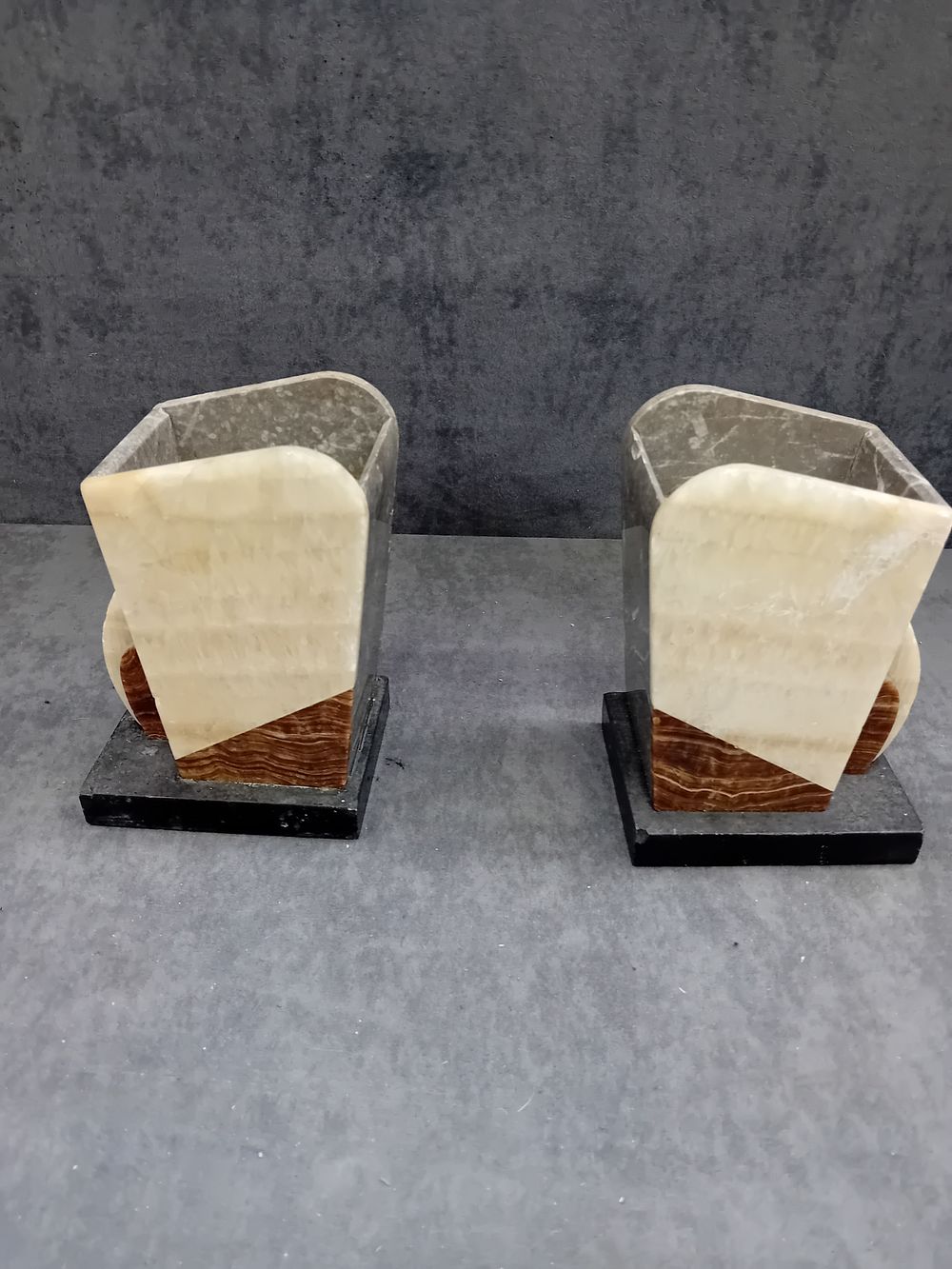 Lot 245: A Pair of Art Deco Stone and Wood Geometric Bookends