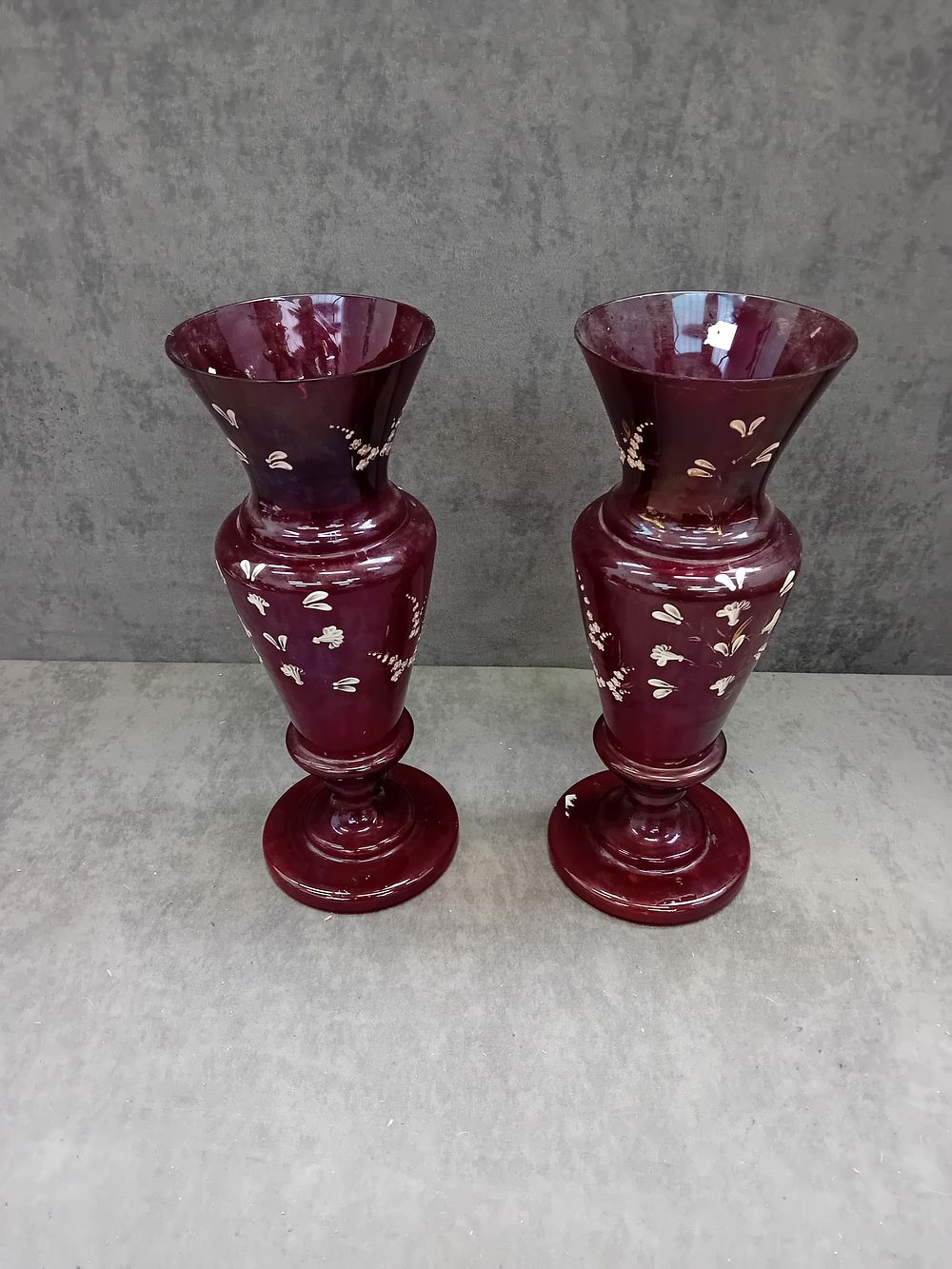 Lot 249: A Pair of Bohemian Cranberry Glass Vases, 32.5cm tall