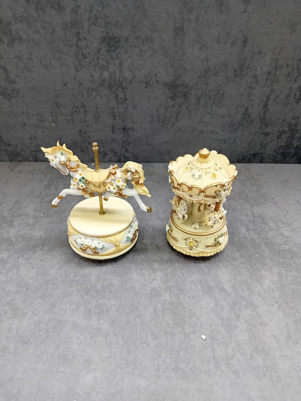 Lot 254: A Pair of Shopehill By Finessa Musical Carousel Boxes