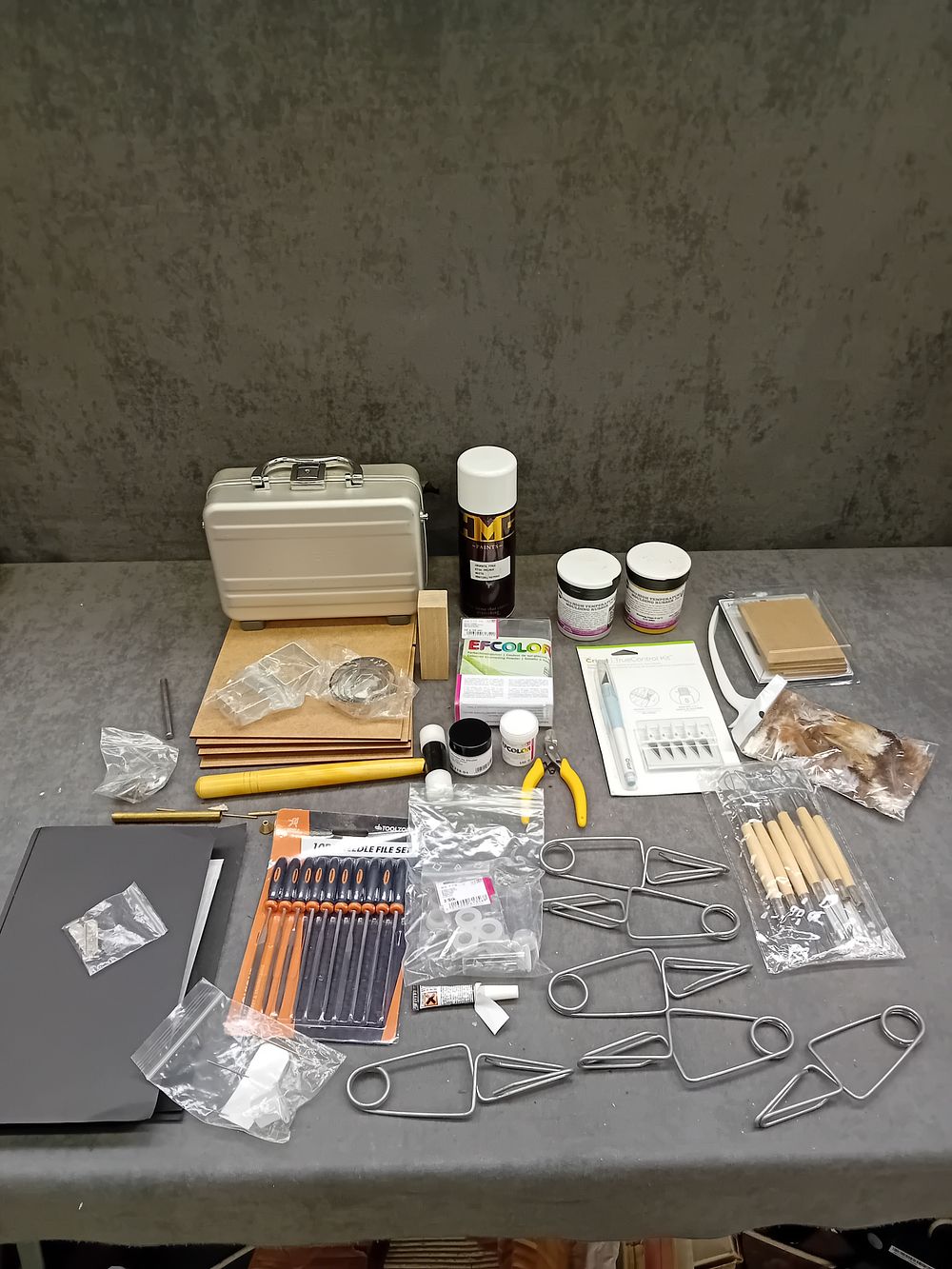 Lot 404: A Collection of Contemporary Craft and Hobby Supplies, including Metalsmithing, Carving, and Enamelling Tools