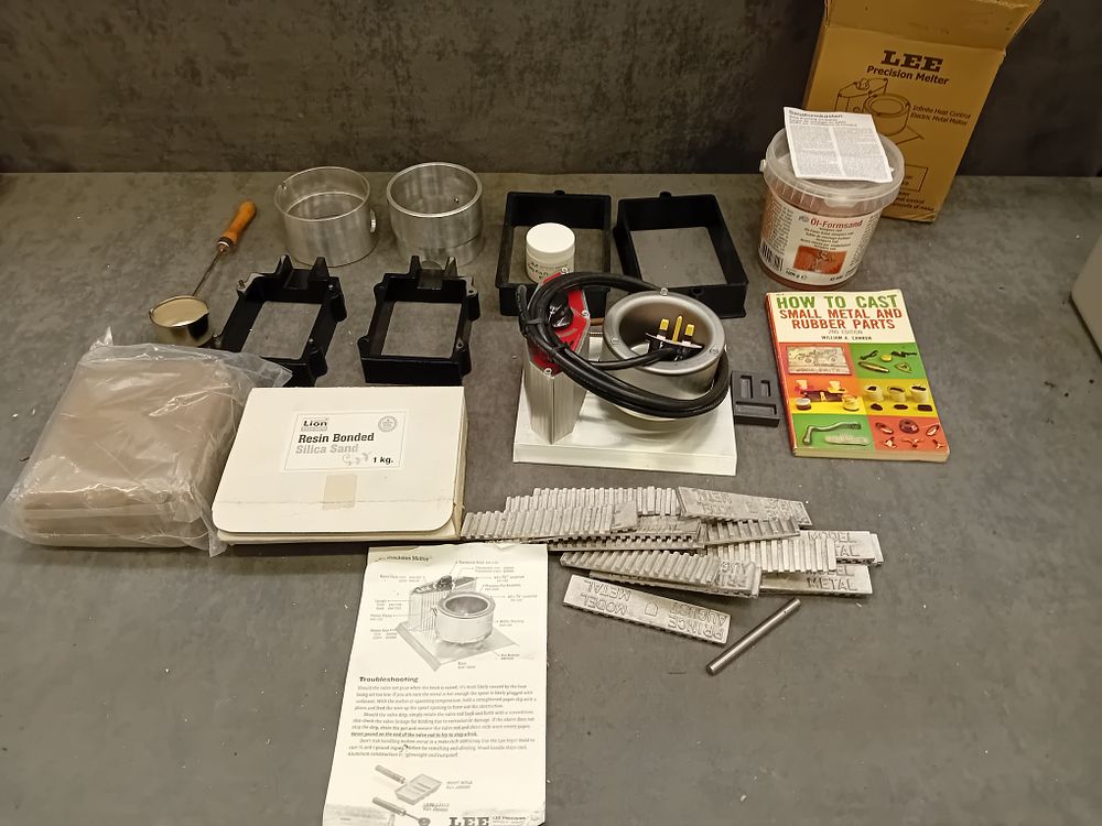 Lot 406: A Lee Precision Lead Melting Pot and Comprehensive Metal Casting Kit
