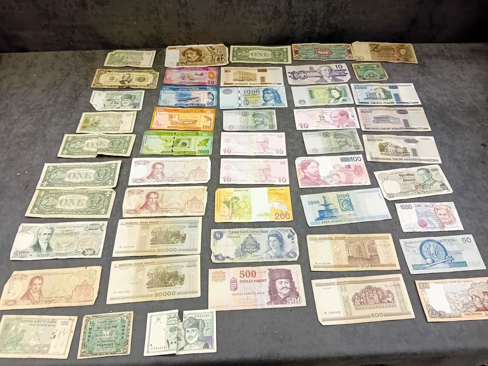 Lot 408: A Collection of Assorted World Banknotes