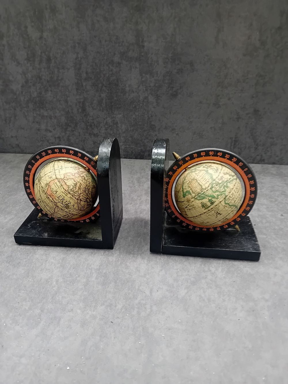 Lot 221: A Pair of Vintage Wooden Old World Spinning Globe Bookends