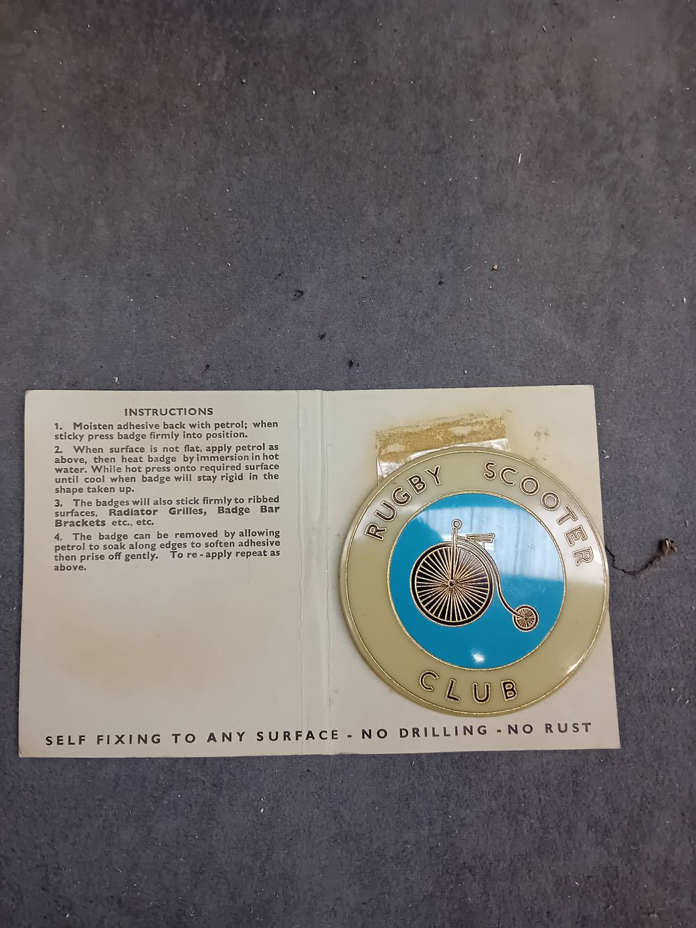 Lot 490: A Vintage Renamel Rugby Scooter Club Self-Fixing Enamel Badge with Penny-Farthing Design