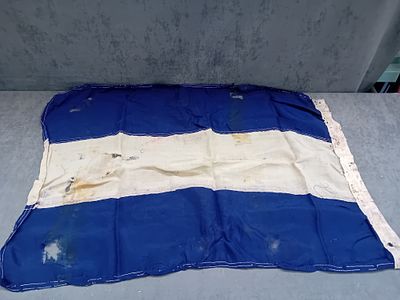 A Blue, White, and Blue Striped Textile Flag, 64cm x 100cm. A textile flag featuring three 