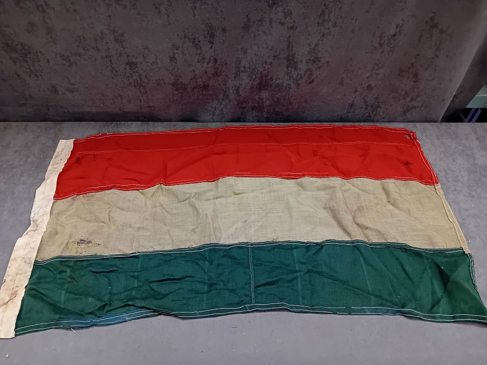 Lot 44: A WWII Period Horizontal Tricolor Flag, Red, Cream, and Green