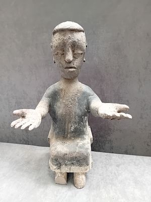 Ghana Fante Seated figure With outstreched arms and up turned hands 47 cm Tall as pictured