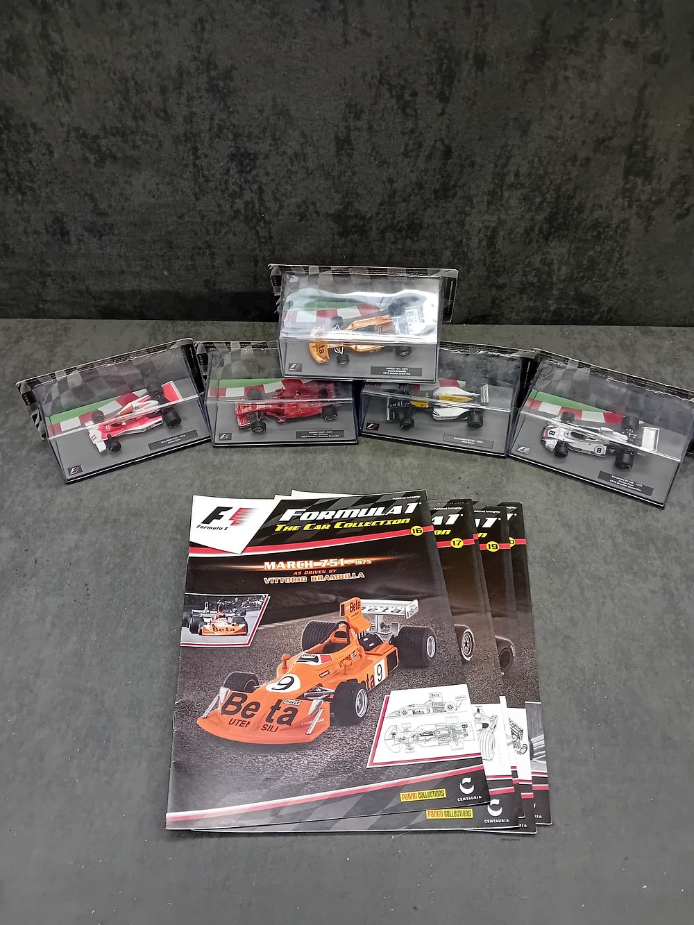 Lot 327: A Collection of Five Panini Collections Formula 1 The Car Collection Die-Cast Models with Magazines