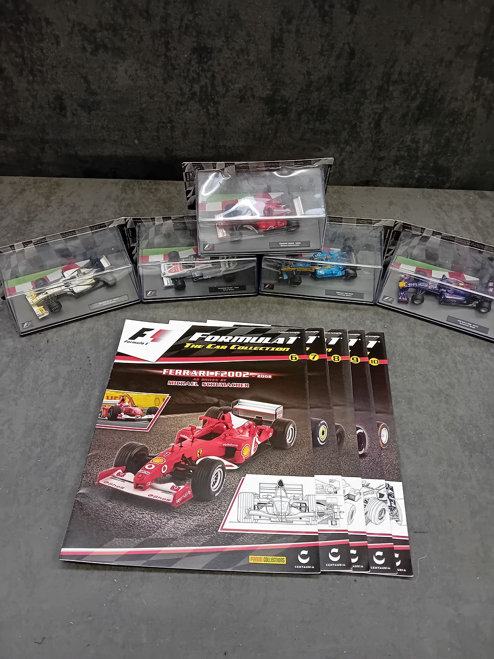 Lot 329: A Group of 5 Panini Collections & Centauria 'FORMULA 1 THE CAR COLLECTION' 1/43 Scale Die-Cast Formula 1 Model Cars with Magazines
