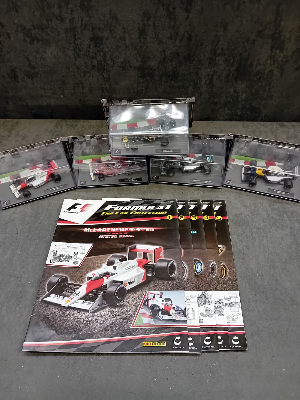 Lot 330: A Collection of 5 Formula 1 The Car Collection 1:43 Scale Die-Cast Model Cars and Magazines