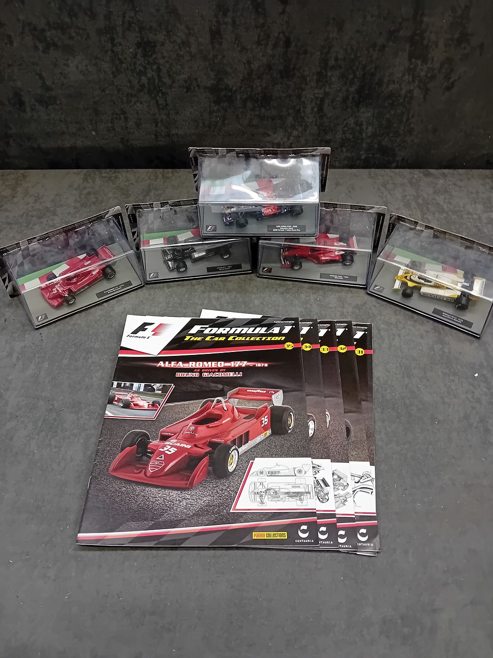 Lot 332: A Collection of 5 Panini/Centauria 'Formula 1 The Car Collection' 1:43 Scale Die-Cast Models with Magazines