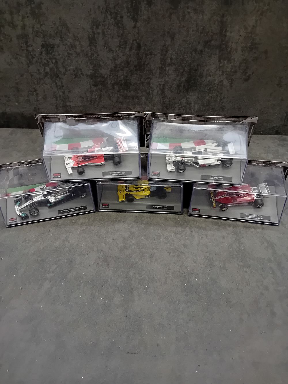 Lot 342: A Collection of Five Panini Formula 1 The Car Collection 1:43 Scale Die-Cast Model Cars