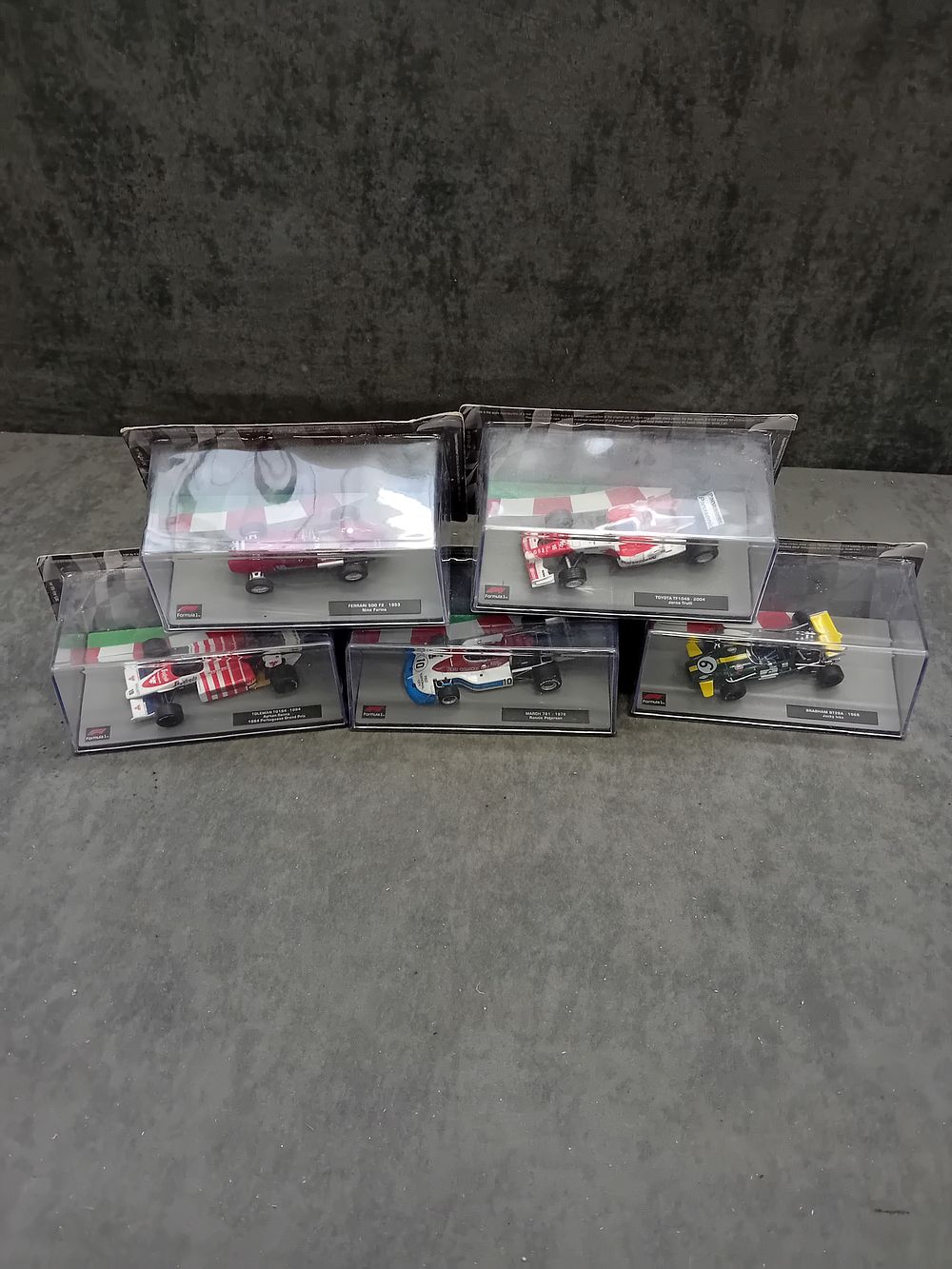 Lot 343: A Collection of Five Panini Formula 1 The Car Collection 1:43 Scale Die-Cast Model Cars, Issues 86 to 90