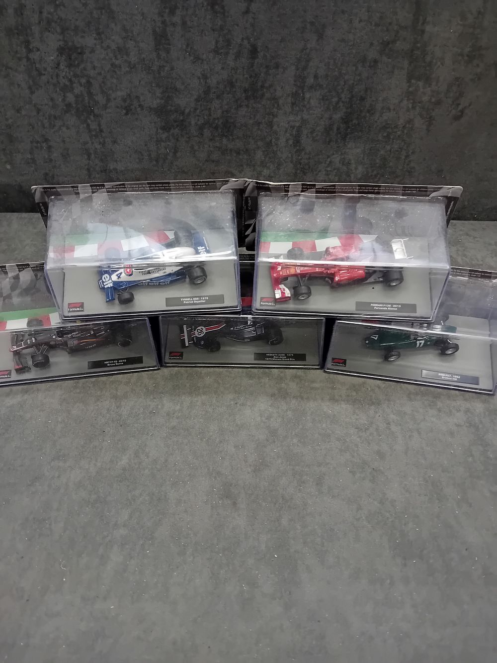Lot 345: A Collection of Five Panini Formula 1 The Car Collection 1:43 Scale Die-Cast Models, Issues 96 to 100