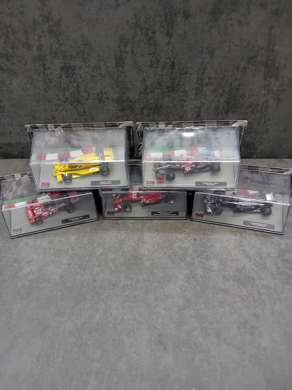 Lot 348: A Burago 1:43 Scale Die-Cast 5-Car Set of Formula 1 Racing Models