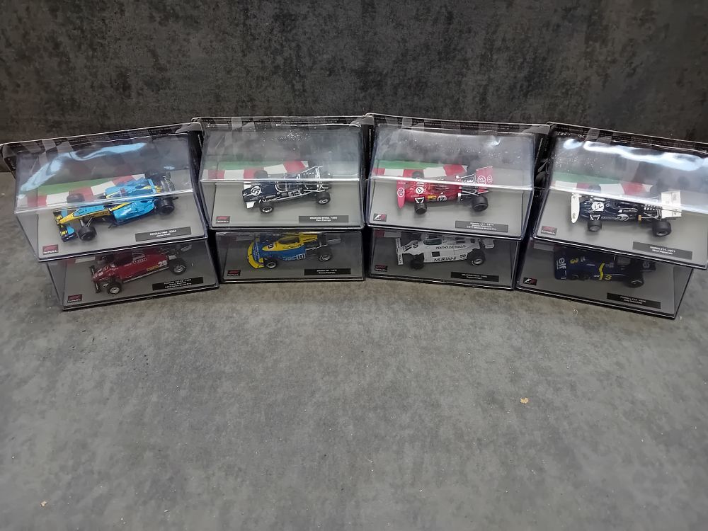 Lot 356: A Collection of Eight 1:43 Scale Die-Cast Formula 1 Race Cars