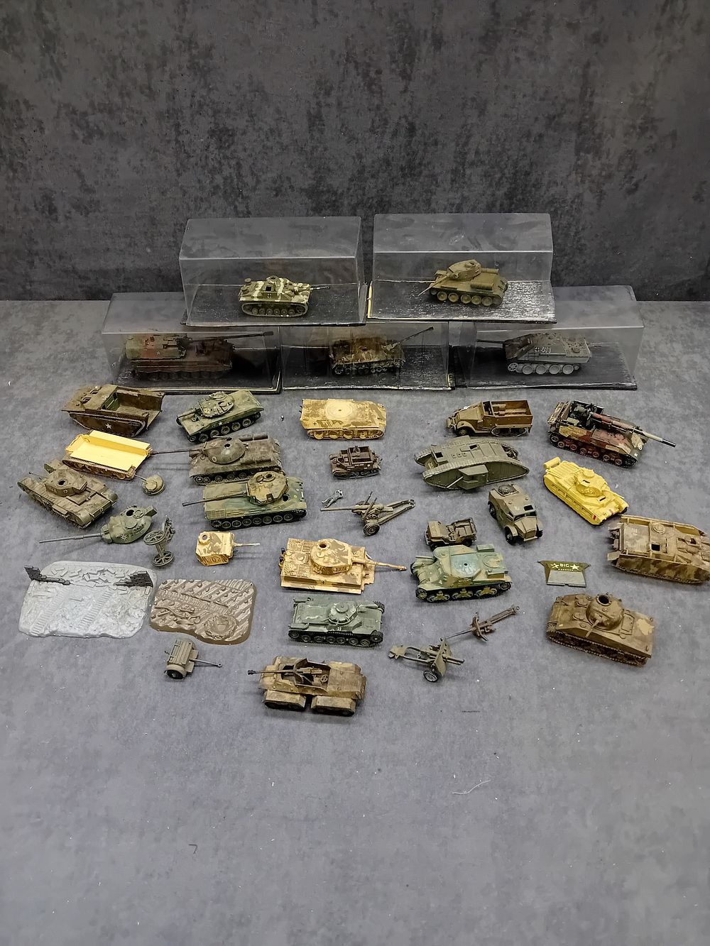 Lot 363: A Collection of World War I and World War II Miniature Military Vehicles, in Plastic and Die-Cast