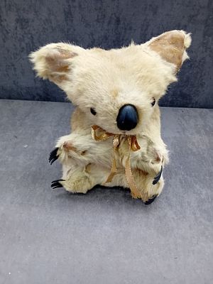 Vintage Real Fur Koala Bear Stuffed Animal. A vintage koala bear stuffed animal, crafted from 
