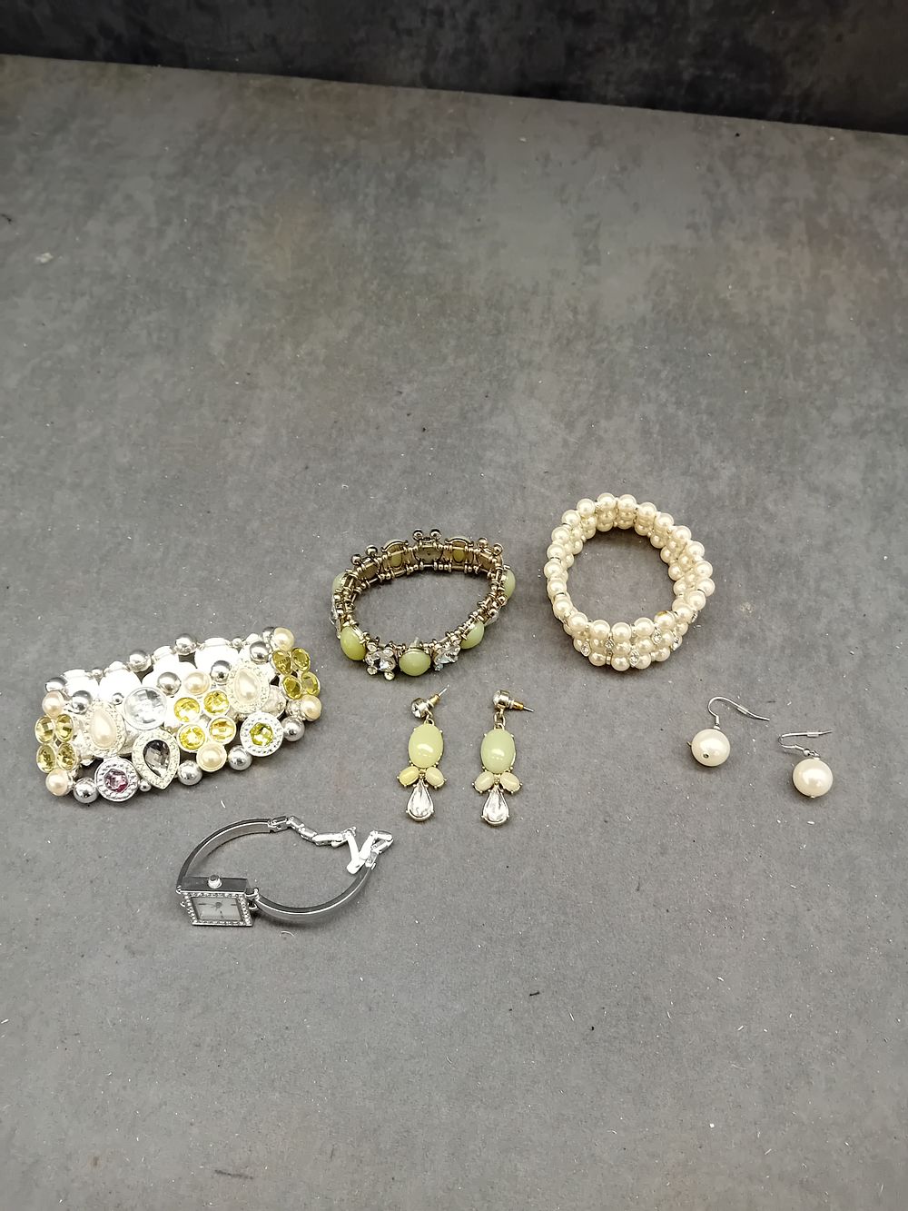 Lot 220: A Collection of Modern or Contemporary Costume Jewelry, including Bracelets, Earrings, and a Watch