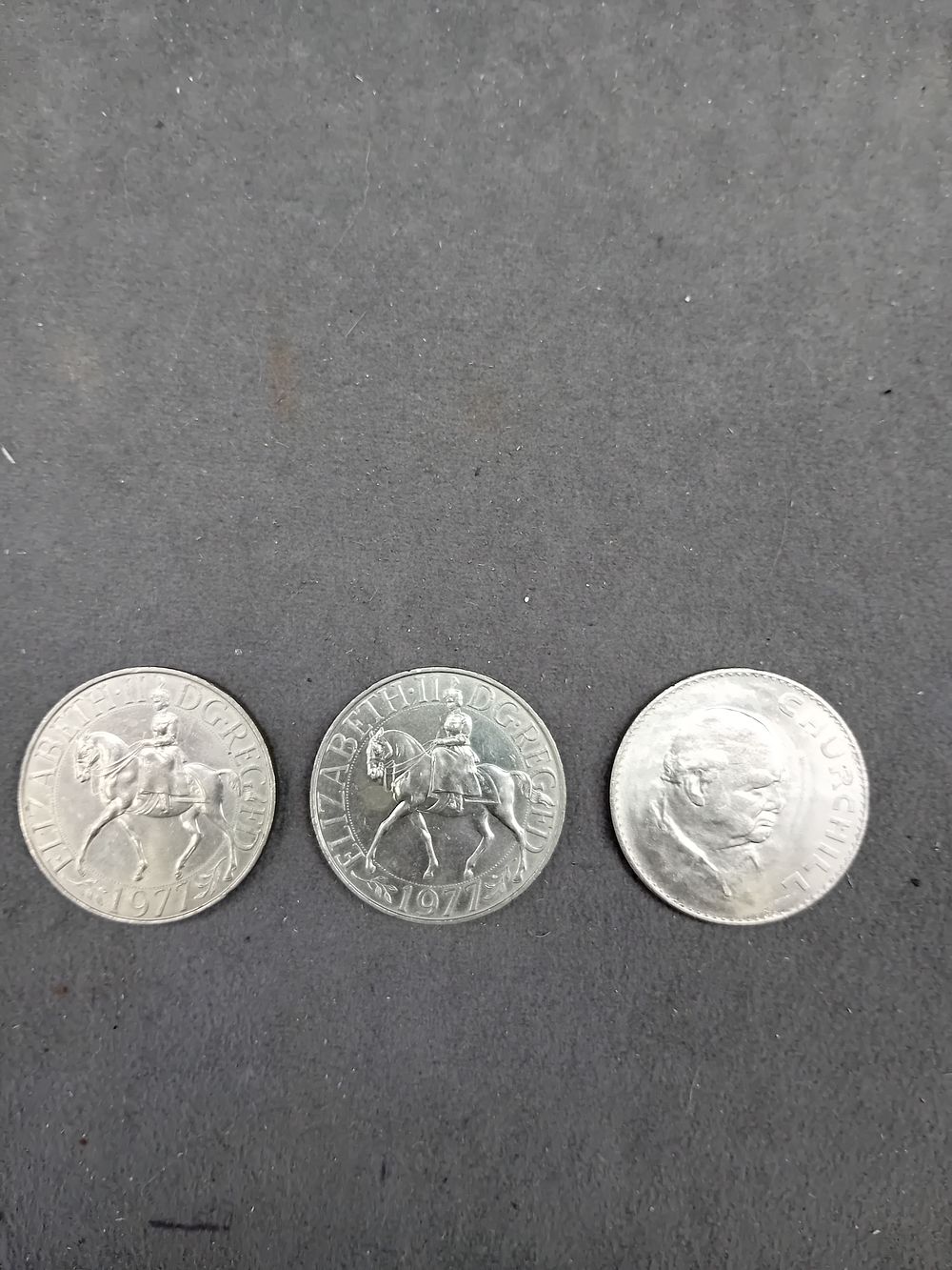 Lot 622: A Collection of British and Other Commemorative Coins, including two 1977 Queen Elizabeth II Silver Jubilee Crowns