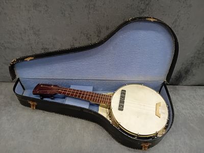 A Vintage Four-String Banjo Ukulele, circa 1920s, with Fitted Case. A vintage four-string 
