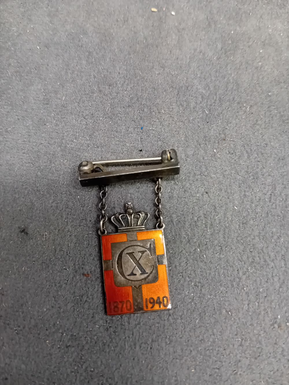 Lot 462: A Georg Jensen Danish Sterling Silver and Enamel King Christian X Commemorative Brooch, 1870-1940