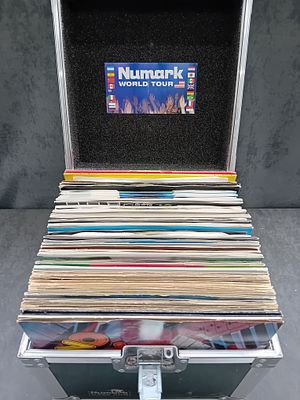 A Numark CASEBOX Flight Case with a Collection of Approximately 50-70 Vinyl Records. This lot 