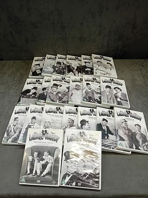 A Collection of 21 Laurel & Hardy DVDs. A collection of 21 Laurel &amp; Hardy DVDs, presented in 