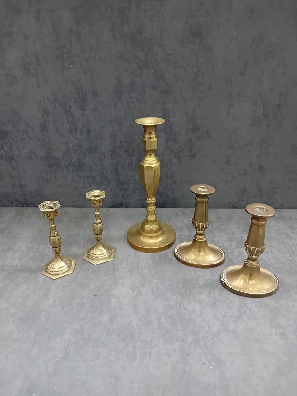 Lot 482: A Group of Antique Brass Candlesticks