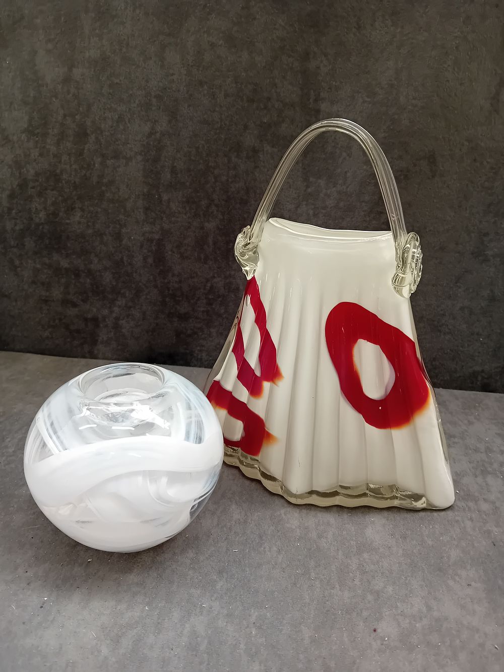 Lot 584: A Murano Style Art Glass Purse Vase and a Companion Art Glass Votive